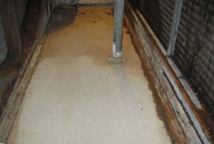 corroded steel chamber floor